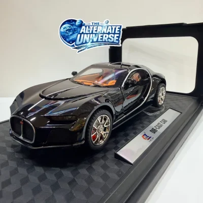Bugatti Atlantic 1:24, featuring a black finish and orange interior