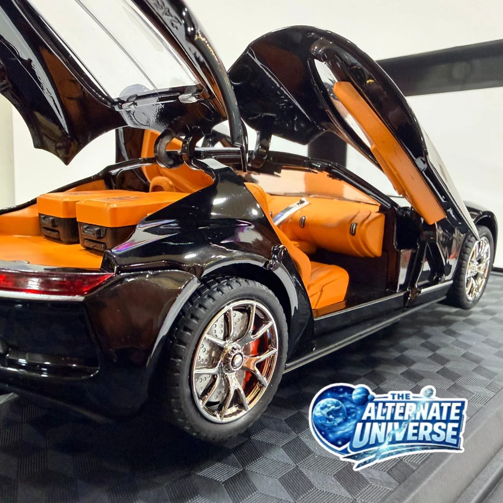 Bugatti Atlantic 1:24, featuring a black finish and orange interior - Image 3