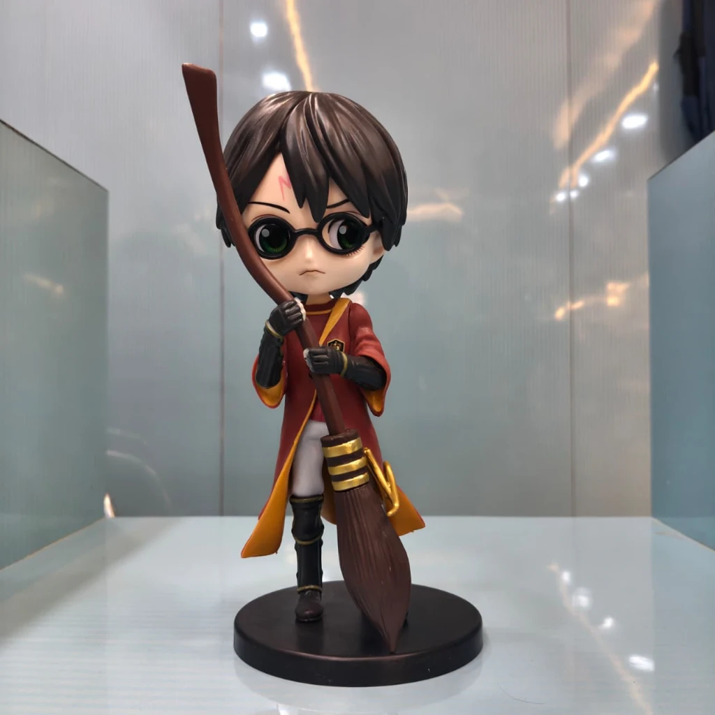 HARRY WITH NIMBUS 2000 23cm FIGURE