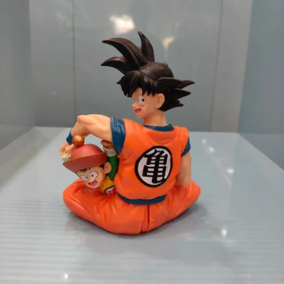 GOKU WITH GOHAN ON LAP