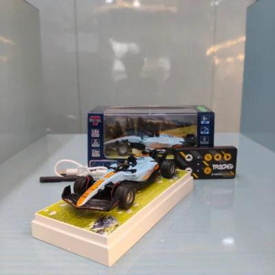 Trasped Mini F1 Racer – 1:64 Metal RC Car with App + Remote Control (Gulf Edition)